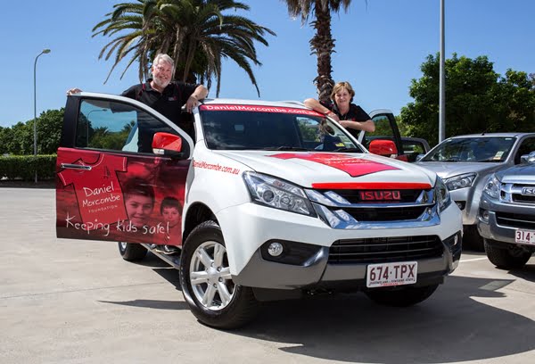 2014 Bruce & Denise Morcombe with their new Isuzu MU-X web