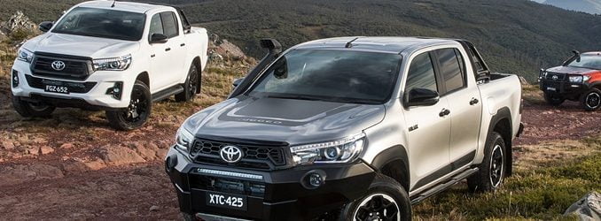 2018 Toyota HiLux Rugged X (front), Rogue (left) and Rugged (rear)