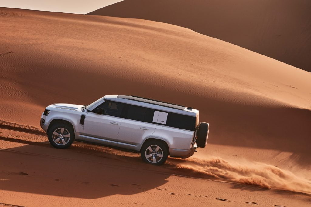 Land Rover Defender 130 sand driving