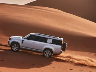 Land Rover Defender 130 sand driving