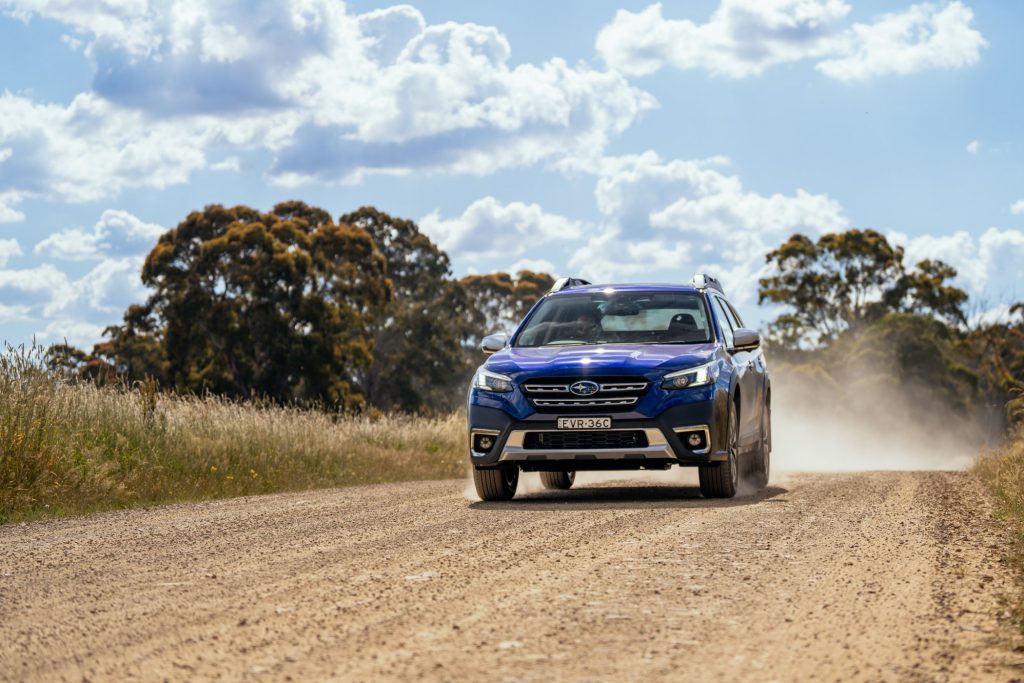 2023 Subaru Outback Touring XT Sapphire Blue driving 1