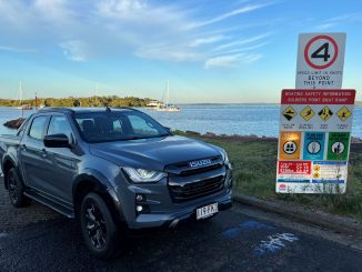 2023 Isuzu D-Max X-Terrain front quarter on boat ramp sunrise 2