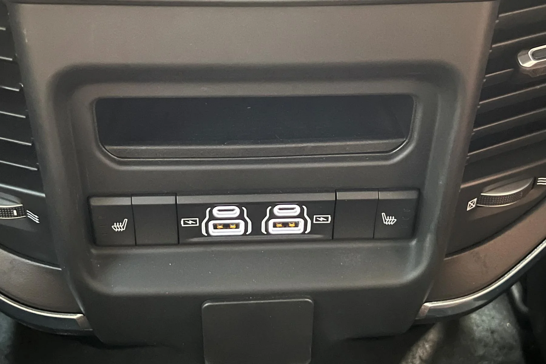 RAM 1500 Laramie Sport interior rear seats USB and heater controls