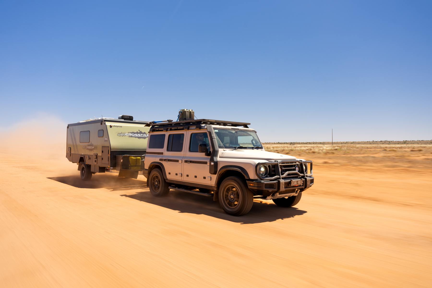 Ineos Grenadier 2024 Towing a caravan on the outback dirt road 2