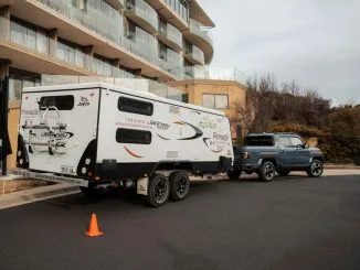 KIA - TASMAN_towing a caravan
