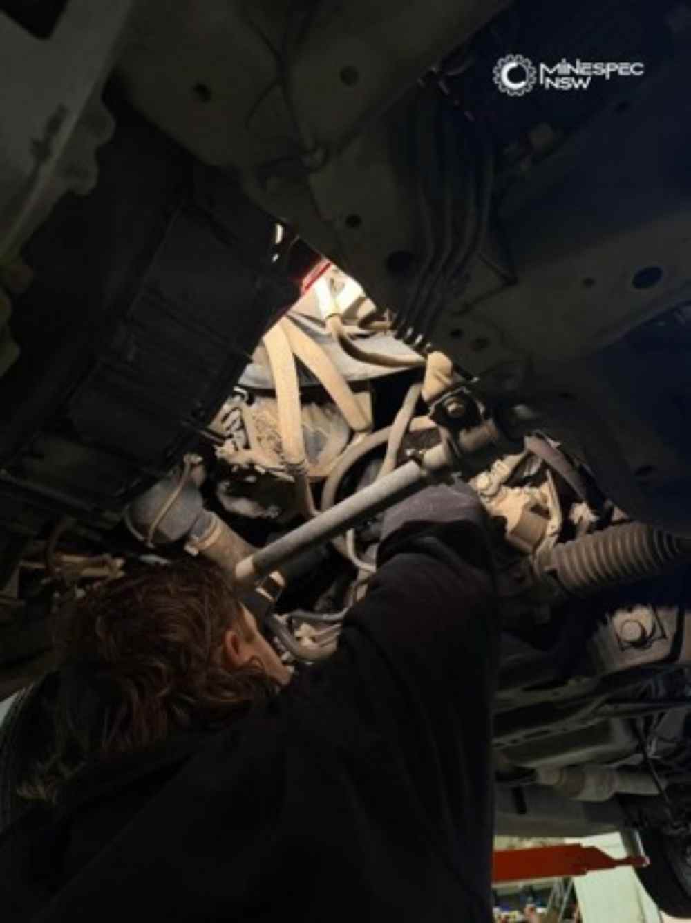 MineSpec NSW technicians carrying out suspension upgrades and vehicle modifications.